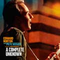 A complete unknown cartel reducido Edward Norton como Pete Seeger